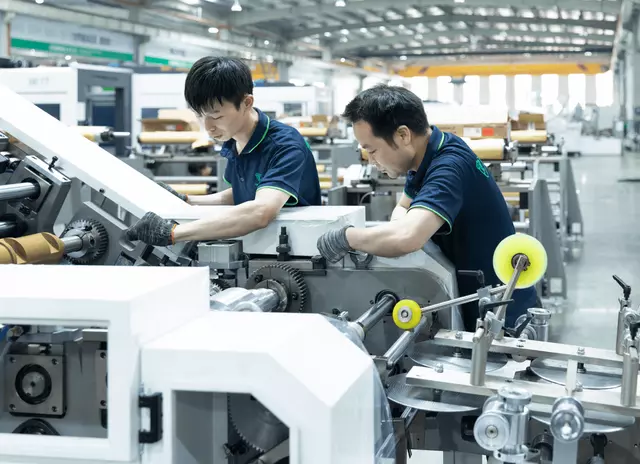 OYANG Engineer Assembling Precision Parts on CNC Line