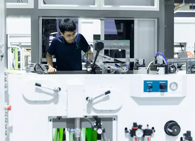 OYANG Quality Control Inspector Checking Web Tension
